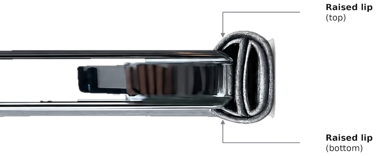 Edge-on view of the case showing the raised lip at the top and the raised lip at the bottom